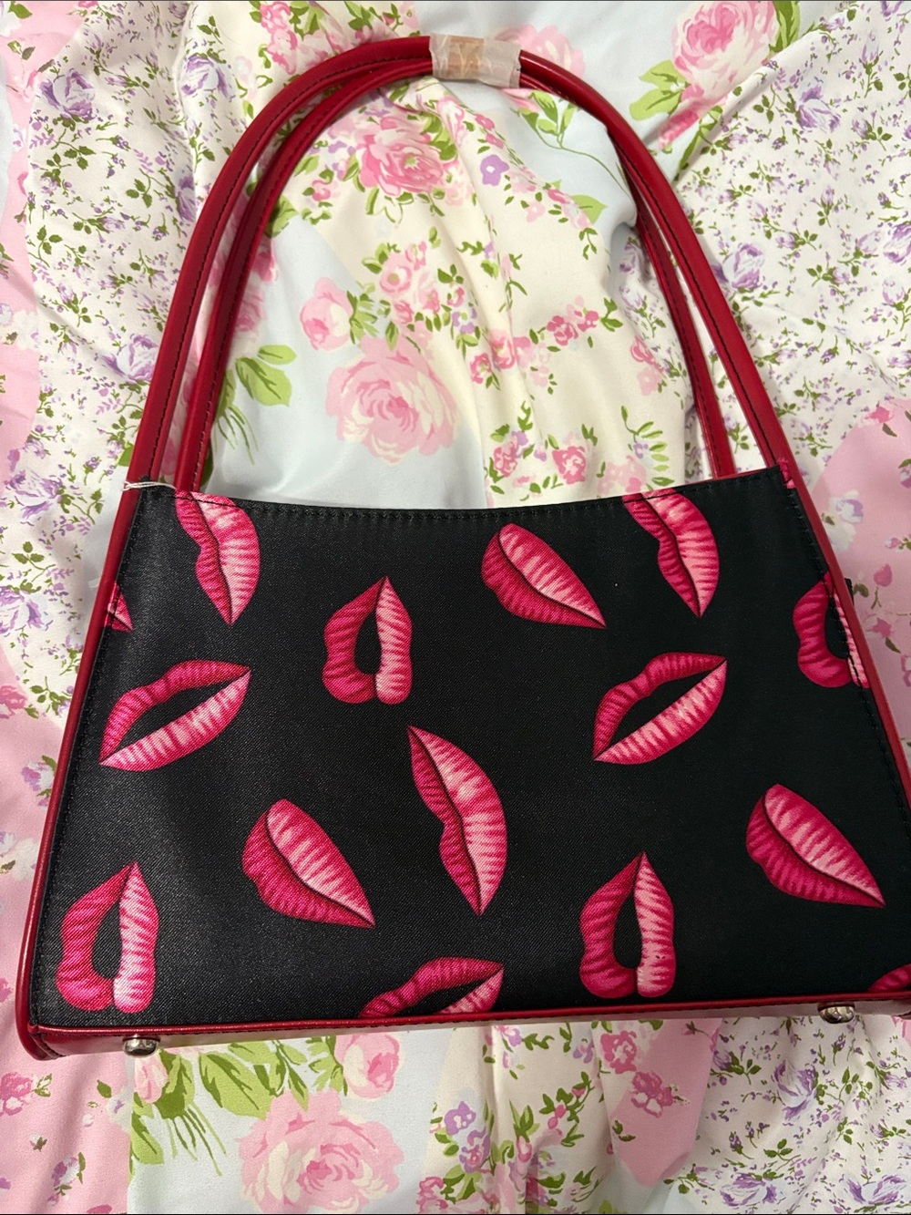 Black purse with Pink Lip Print and Red Trim
